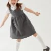 M&S Collection Dresses School Girls' Cotton Pinafore (2-12 Yrs) 1 M&S Collection Dresses School Girls' Cotton Pinafore (2-12 Yrs) -SCHOOL UNIFORM Sales SD 04 T76 1773 T0 X EC 0